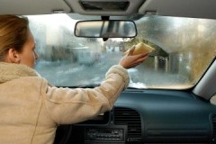 An assortment of tools and ways to remove fogging glass in a car