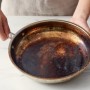 Consells útils sobre com i com es poden netejar els dipòsits de carboni d'una olla d'esmalt per dins i per fora